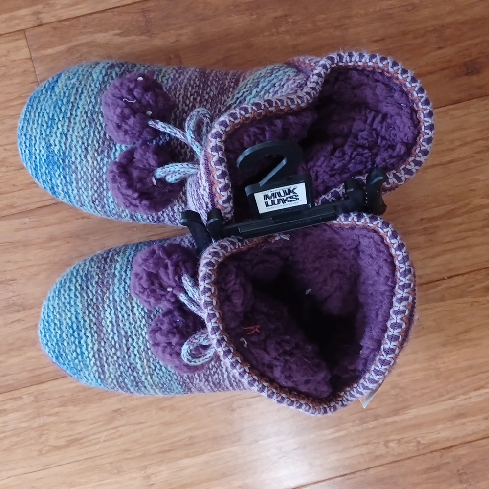 Muk Luks Multi- colored hard soled slippers.